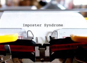 "Imposter Syndrome" printed on a typewriter.