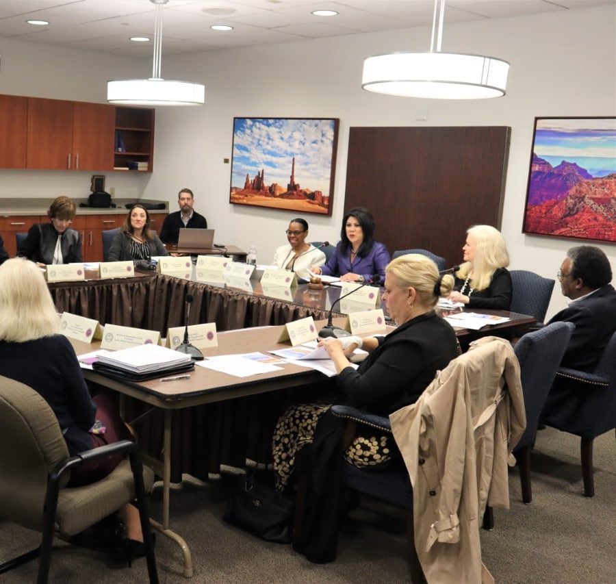 Sharon Lechter at a board meeting with a group of other individuals on the board