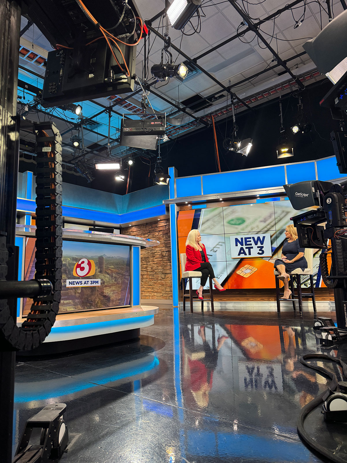 Sharon Lechter on the New at 3 News speaking to an anchor who is interviewing her