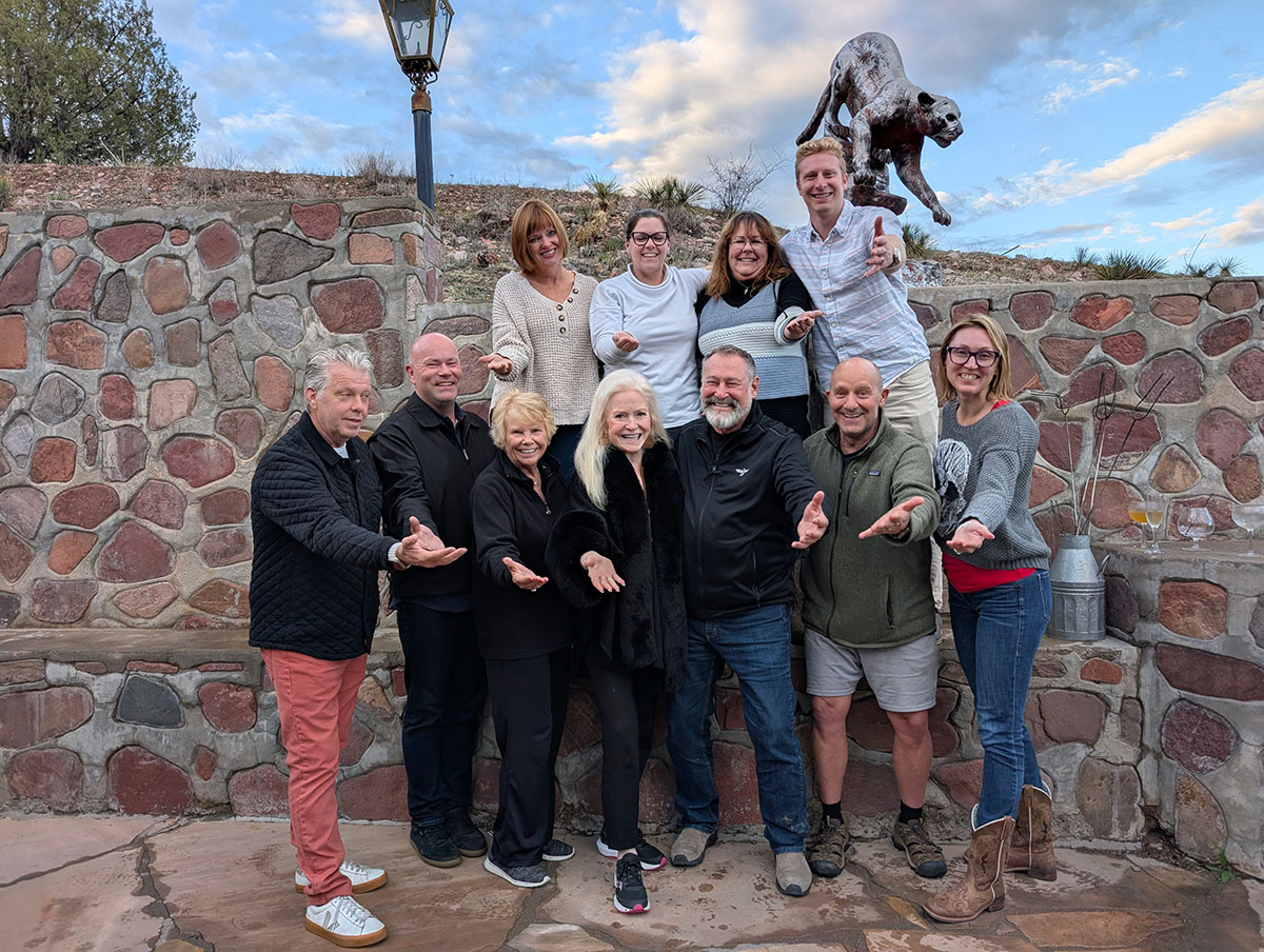 Sharon Lechter with a group of individuals from the mentor retreat