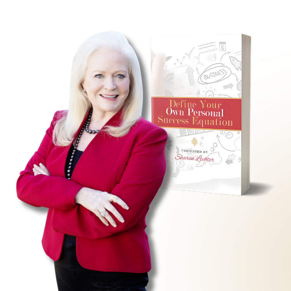 A smiling woman with long blonde hair, in a red blazer and black top, stands confidently with arms crossed in front of the Personal Success Equation.