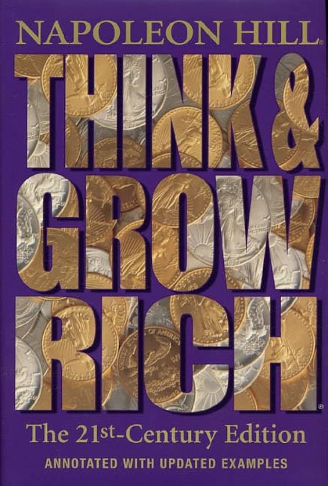 Hardcover book cover for Think and Grow Rich features the title in large gold letters over a background of overlapping coins, with a purple border and gold text.