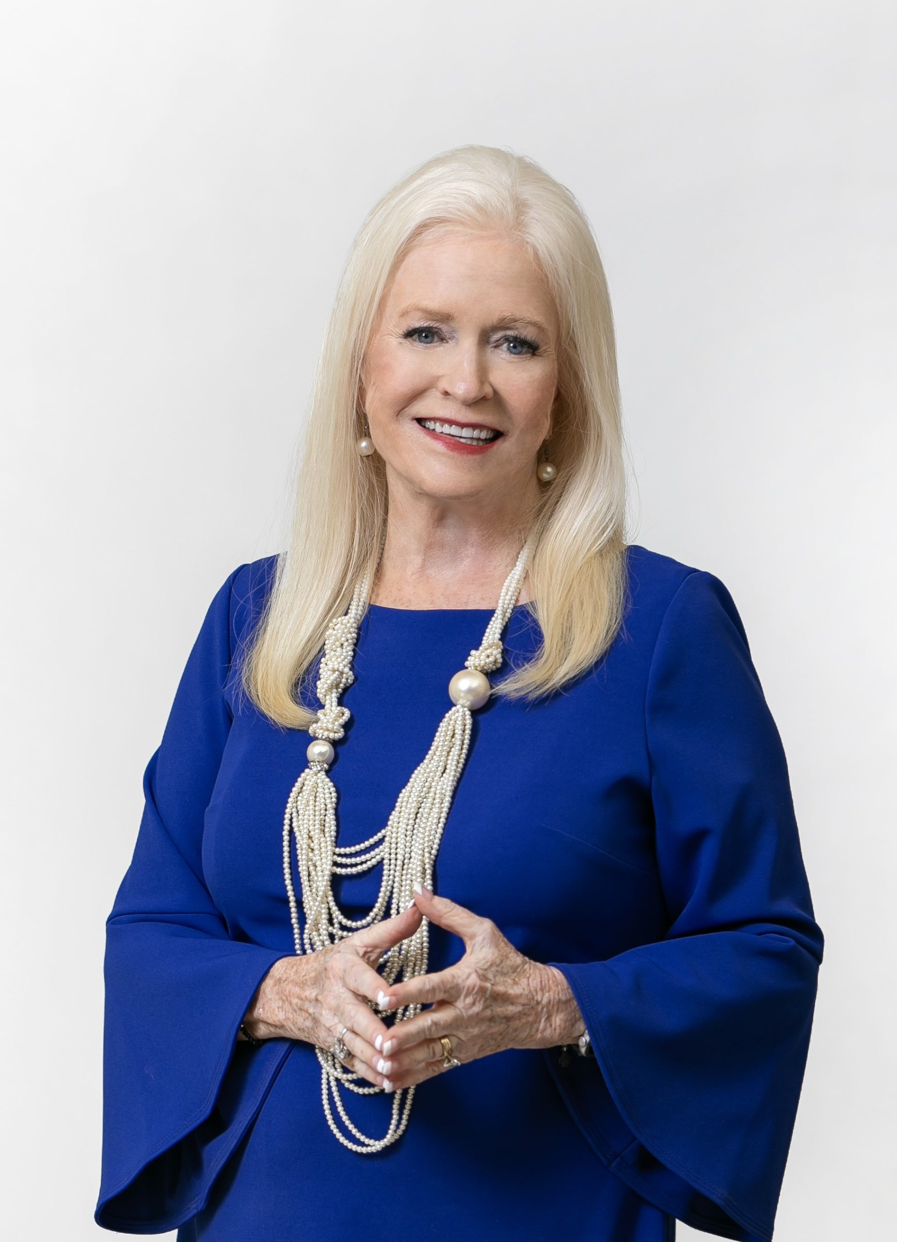 Portrait of Sharon Lechter in a Blue Dress